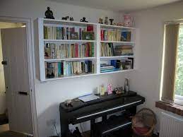 hanging wall mounted bookcase vizimac bookshelves bookshelf design large ornate mirror