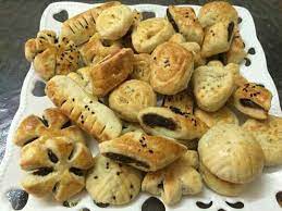 pics that i collect from iraqi pages the traditional iraqi date kleicha صور جمعتها من البيحات العراقيه كليجه التمر العراقيه food doodle on photo desserts