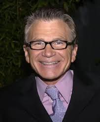 Ellis Wolfe playing like his father David going to work, 1923. From the  David Wolfe collection of family glass negative photos.