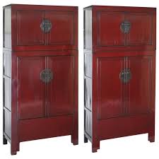 Chinese red lacquer cabinet with 2 drawers and 2 doors. Antique Pair Of Chinese Red Lacquer Compound Storage Cabinets Stacked For Sale At 1stdibs