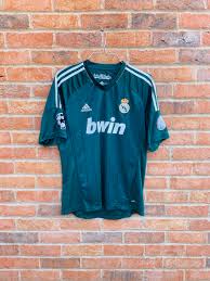 Real madrid is a professional football club in spain. One2elevenkits Classicfootball On Twitter Real Madrid Cl Third 2012 13 Large 24 99 Rare Third Shirt As Worn In The 12 13 Champions League Campaign When The Side Defeated Manchester United At Old Trafford