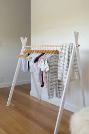 This creates a simplified, honest mood to a room. 20 Astoundingly Simple Diy Clothes Rack Tutorials Crafty Club Diy Craft Ideas