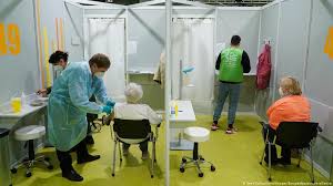 It could be ready next month. Angela Merkel Covid Vaccines Could Be Necessary For Years News Dw 01 02 2021