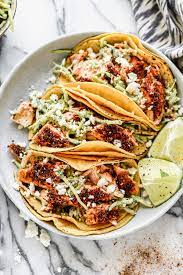 Meet the most marvelous way to eat fish: Salmon Tacos With Slaw Easy Healthy Recipe Wellplated Com