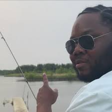 Caitlin “So Icey” Clark in downtown Indianapolis showing off her diamond  chains after cashing in