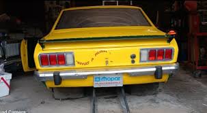 Image result for Bright Yellow 1973 Colt