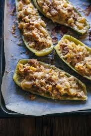 Tuna Stuffed Zucchini Boats Light And Delicious Meal Recipe In 2020 Zucchini Tuna Zucchini Zucchini Boats