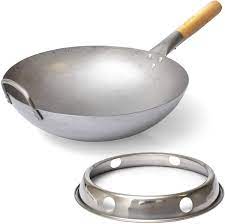 Wok, which means frying pan in chinese, has been invented more than 2,000 years ago. Amazon Com 14 Inch Wok Pan With Ring 2 Piece Woks And Stir Fry Pans For Home And Professional Cooking Hand Hammered Carbon Steel Wok With Wooden Handle The