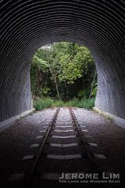 The railway tunnel is located behind the bus stop opposite maju camp and down the slope.this railway tunnel that runs below clementi road. A New Light At The End Of The Old Railway Tunnel The Long And Winding Road