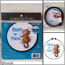 Our cross stitch patterns come in a range of designs, from letters to flowers and for a range of difficulty. Stamped Cross Stitch Kit Hang In There With Hoop By Dimensions Knituk