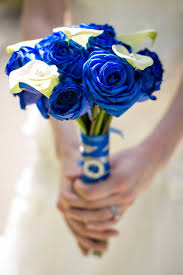 Late spring is a beautiful time of year to get married in albuquerque! Dyed Blue Rose Bridal Bouquet
