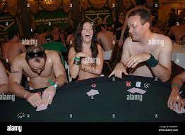 Poker players at the World Strip Poker Championships at the Cafe Royal in  central London Stock Photo - Alamy
