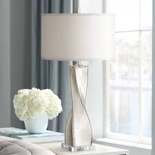 The key to creating the faux mercury glass look is to add an additional layer of gold paint to the base coat, using the side of the foam brush as a dauber. Mercury Glass Table Lamps Lamps Plus
