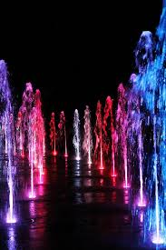 What is a water color painting? Multi Colored Water Fountain Photograph By Alina Skye