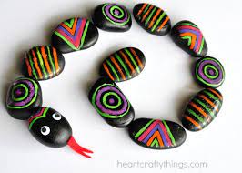 What kind of art can you do with rocks? Patterned Rocks Snake Craft I Heart Crafty Things