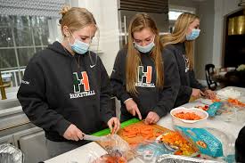 Hopkinton girls basketball team cooks meal for homeless shelter