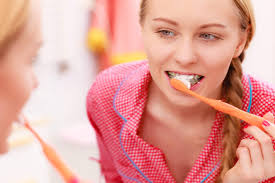 Next, push the bristles of the braces toothbrush under the wires. How To Brush Your Teeth While Wearing Braces Beach Braces