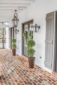 Modern farmhouse, covered terrace, open planning, high ceiling in the living room, two living areas. 75 Beautiful Brick Farmhouse Pictures Ideas Houzz