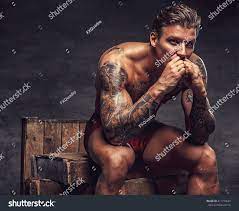 Naked Muscular Tattooed Guy Sitting On Stock Photo 411774637 | Shutterstock