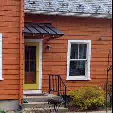 The zinc rich epoxy primer provides your custom metal front door with an additional layer of protection. Standing Seam Metal Roof Portico I Need This Over My Garage Access Door Farmhouse Patio Doors Metal Roof Portico Farmhouse Patio