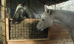 We got pallet pieces from the industrial at a very low cost. Save Money On Hay With These Diy Slow Feeders Cowgirl Magazine