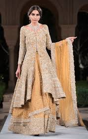 Graceful And Stylish Designer Lehenga Featured In Champagne Color Net And Dupion Silk Wi Pakistani Bridal Dresses Indian Bridal Dress Pakistani Wedding Dresses