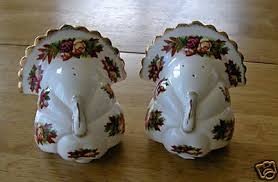 They look like anime cats with large slanted green eyes, yellow polka dotted. Royal Albert Turkey Salt And Pepper Shakers 47122502