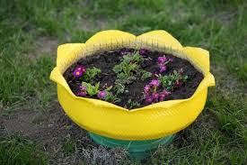 After you paint your tire, drill the bottom of the tire to make a few drainage holes, just like you did in the tree stump planter project. 30 Creative Ways To Use Old Tires In Your Garden Diy Crafts