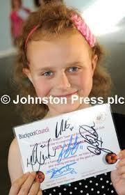 25015298-Pictures Martin Bostock Schoolchildren from Blackpool schools at a  special party at Blackpool football club to celebrate their 100%  attendance. St Nicholsas school.
