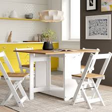 Feature made of mdf and iron pipes, it is sturdy and durable includes a sturdy oval table and two chairs compact design suitable for small space, such as bistro, kitchen, apartments, there is an extra rack under the desktop. White Small Table And Chairs Wayfair Co Uk