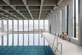 The Disused Shelter For Rescue Forces At The Edge Of The Erlenbach School Campus Had Disappeare Swimming Pool Architecture Indoor Swimming Pools Swimming Pools