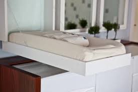 25 Hacks To Make Room For A Baby In Your Tiny Home Baby Changing Table Murphy Bed Home Hacks