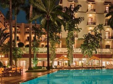 The Oberoi Grand's heritage poolside courtyard, AI generated