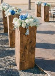Create a multifaceted ceremony look with decor elements at different heights. Bohemian Flower Design Novocom Top