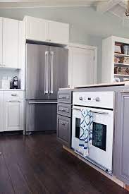 If your kitchen is large enough to have an island, floating cabinets can really enhance the look of the room. Iheart Organizing Do It Yourself Floating Laminate Floor Installation House Flooring Floor Installation Wood Floors Wide Plank