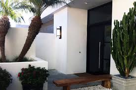 When finished at its smoothest and whitest, it's the face of modernist. Contemporary Storefront Entry Glass Door System Smooth Stucco Tropical Entry Orange County By Moss Yaw Design Studio Houzz