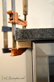 We attached a piece of right angle aluminum with silicone. Diy Built In Wine Cooler H2obungalow