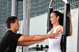 Notice to our dearest customers: Woman In The Fitness Gim Working Out With Personal Trainer Coach Stock Photo Picture And Royalty Free Image Image 5336025