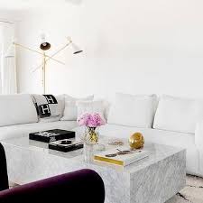 While marble design printed glass adds a sophisticated, glossy feel, beveled edges craft a realistic stone look. Marble Block Cocktail Table Design Ideas