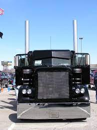 Tricked Out Semi Trucks Mid-america Truck Show Blacked Out Pete Trucks Show Trucks Semi Trucks