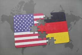 The german empire or the state of germany, also referred to as imperial germany, the second reich, the kaiserreich, as well as simply germany, was the period of the german reich from the unification of germany in 1871 until the november revolution in 1918, when the german reich changed its form of government from a monarchy to a republic. Puzzle With The National Flag Of United States Of America And Germany On A World Map Background Stock Photo Image Of Germany Danger 100604654