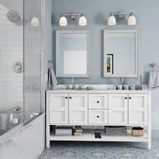 Made from square tiles in different sizes and colors, the bath's mosaic floor is a fresh update on a classic checkerboard pattern. Explore Coastal Bathroom Styles For Your Home