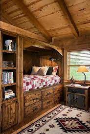 Space Saving Built In Cubby Hole Bed With Six Drawers Underneath And Adjacent Shelves Cabinets Plus Cabin Interior Design Cabin Interiors Log Cabin Interior