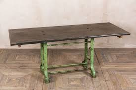 Painted metal chairs flank a metal tray table. Antiques Atlas Industrial Vintage Metal Dining Table