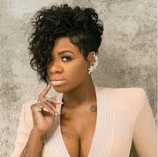 Talking about the black short hairstyles, they short dark hairstyle having one side longer than the other and soft, angular bangs caressing the forehead, creates a carefree look for the woman. 40 Short Hairstyle For Black Women