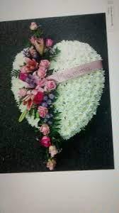These funeral stands are all in the shape of hearts, showing your love for the person that has been lost. Funeral Bleeding Heart Wreath Funeral Arrangement In Ambler Pa Flowers By Veronica Inc
