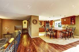 living room. kitchen with tile floor