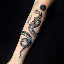 Skindeeptales Wrap Tattoo Wrap Around Ankle Tattoos Around Arm Tattoo