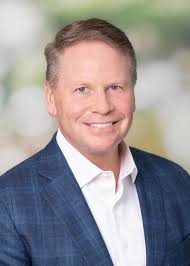 HARRY NORMAN, REALTORS® APPOINTS STAN BAKER AS VICE PRESIDENT OF RELOCATION  & BUSINESS DEVELOPMENT