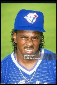 Pitcher Juan Guzman of the Toronto Blue Jay squints his eyes in the... News  Photo